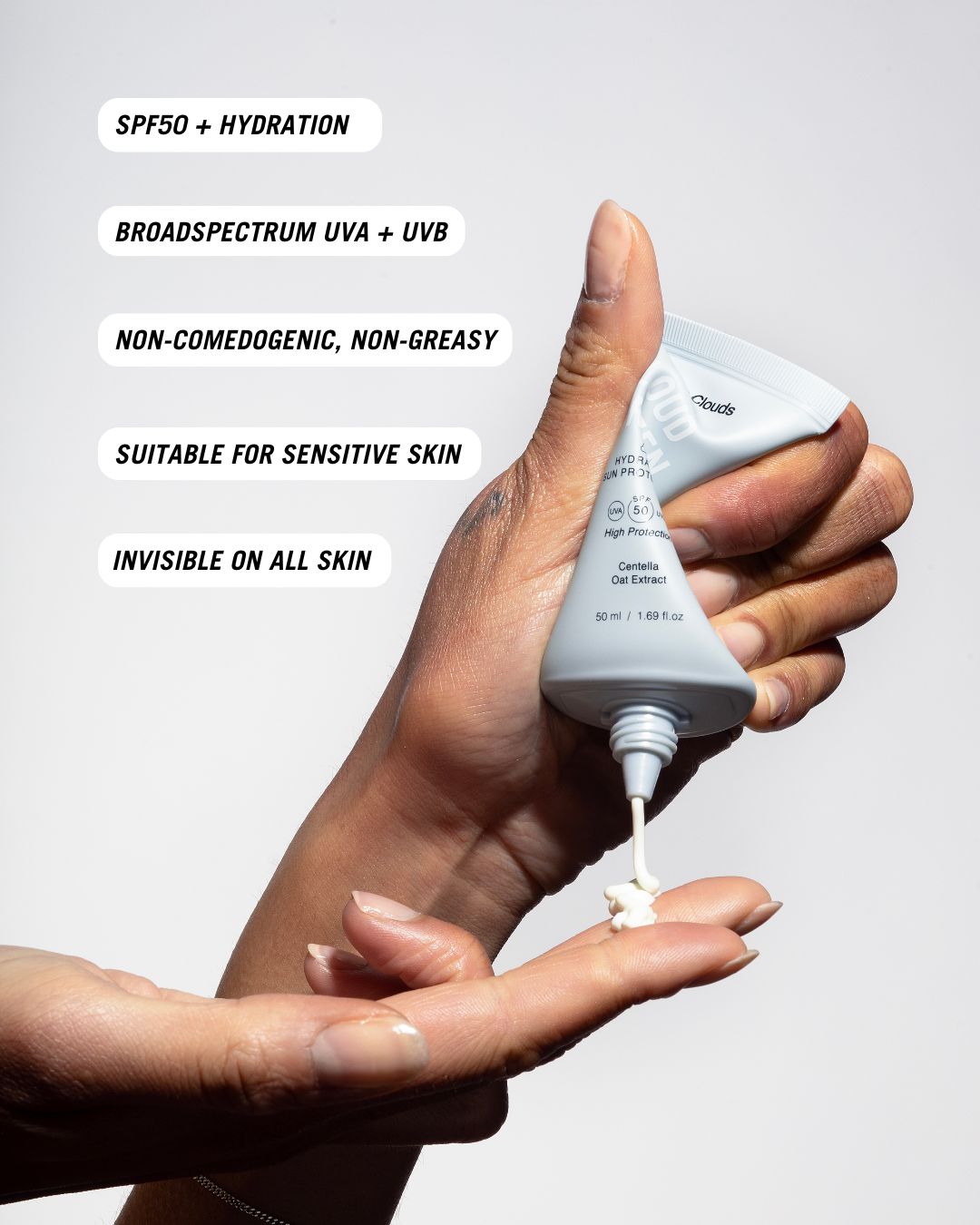 Common Clouds Cloud Screen SPF50 being dispensed from the tube, non-comedogenic, suitable for sensitive skin and invisible on all skin