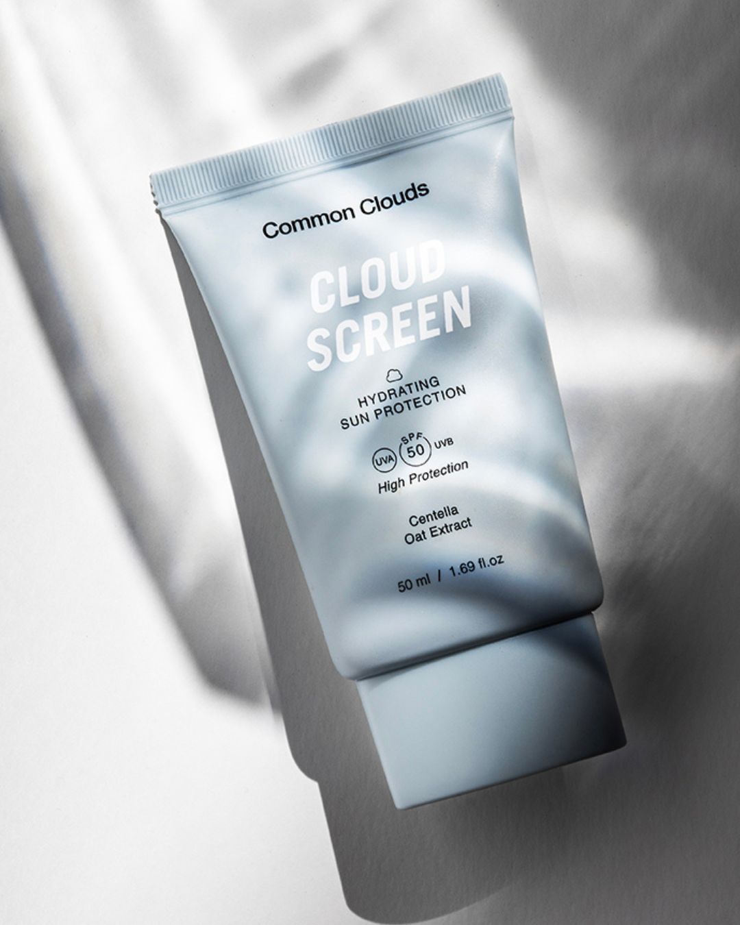 Cloud Screen sunscreen tube with hydrating sun protection, offering high UV protection, Centella and Oat Extract for sensitive skin.