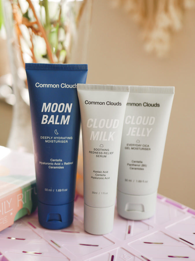 Common Clouds 24H Moisture Trio – Moon Balm, Cloud Milk and Cloud Jelly displayed in soft natural light