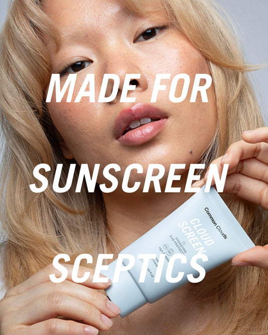 Common Clouds Cloud Screen sunscreen held by a woman, hydrating sun protection for acne-prone skin, made for sunscreen skeptics