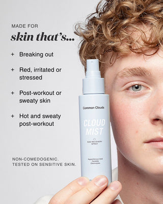 A person holding a bottle of Common Clouds Cloud Mist skin recovery spray against a light gray background with text describing skin types it is made for.